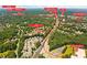 Aerial view highlights home's proximity to Publix, Walgreens, Kroger, Sbux, Aldi, and Dolvin Elementary at 560 Edgehill Pl, Johns Creek, GA 30022