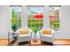 Comfortable living area with backyard view, perfect for relaxing and entertaining at 560 Edgehill Pl, Johns Creek, GA 30022