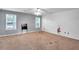 Spacious bedroom with two windows, a ceiling fan, and a chalkboard at 5735 Lake Windsor Pkwy, Buford, GA 30518