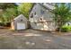 Attached and detached garages with long driveway at 5735 Lake Windsor Pkwy, Buford, GA 30518