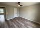 Bedroom showing wood-look flooring and a ceiling fan at 6798 Blackstone Pl # 12, Mableton, GA 30126