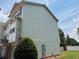 Inviting exterior of a two-story home with light siding and a well-maintained lawn at 6798 Blackstone Pl # 12, Mableton, GA 30126