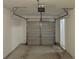 Spacious and clean one-car garage with freshly painted walls and ceiling at 6798 Blackstone Pl # 12, Mableton, GA 30126