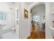 Hallway leading to bathroom, dining room and living area, creating a flow in the home at 830 Barnett Ne St # 2, Atlanta, GA 30306