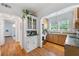 Well-lit kitchen with stainless steel appliances, granite countertops, and hardwood floors at 830 Barnett Ne St # 2, Atlanta, GA 30306