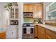 Updated kitchen with stainless steel range and microwave and light wood cabinetry at 830 Barnett Ne St # 2, Atlanta, GA 30306