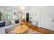 Inviting living room with wood floors, neutral decor, and ample natural light at 830 Barnett Ne St # 2, Atlanta, GA 30306