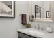 Elegant powder room with marble countertop and stylish fixtures at 328 Brownstones Cir, Atlanta, GA 30312