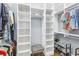 Spacious walk-in closet with custom shelving and ample storage space for an organized wardrobe at 328 Brownstones Cir, Atlanta, GA 30312