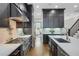 Open concept kitchen with stainless appliances, large island, and hardwood flooring at 328 Brownstones Cir, Atlanta, GA 30312
