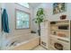 Modern bathroom with a large soaking tub and bright natural light at 4105 Vicksburg Dr, Lawrenceville, GA 30044