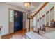 Inviting foyer with hardwood floors, staircase, and ample natural light at 4105 Vicksburg Dr, Lawrenceville, GA 30044