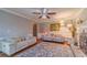 Living room with a fireplace, hardwood floors, large area rug, and neutral paint at 4105 Vicksburg Dr, Lawrenceville, GA 30044