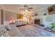 Living room with a fireplace, large area rug, and comfortable seating at 4105 Vicksburg Dr, Lawrenceville, GA 30044