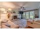 Living room with a fireplace, hardwood floors, large area rug, and view of the backyard at 4105 Vicksburg Dr, Lawrenceville, GA 30044