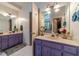 Modern main bathroom features double vanity, mirrors, and glass shower at 4105 Vicksburg Dr, Lawrenceville, GA 30044