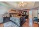 Bright main bedroom boasts tray ceilings, hardwood floors, and sitting area at 4105 Vicksburg Dr, Lawrenceville, GA 30044