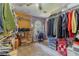 Large walk-in closet with ample storage space, clothing racks, and a dressing area at 4105 Vicksburg Dr, Lawrenceville, GA 30044