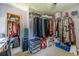 Spacious walk-in closet with clothing racks, shelves, and storage at 4105 Vicksburg Dr, Lawrenceville, GA 30044