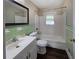 Classic bathroom with vintage green tile accents, and a shower/tub combo at 510 Se Boyds Se Dr, Marietta, GA 30067