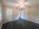 Bedroom boasts hardwood floors, ceiling fan, and neutral-toned walls at 510 Se Boyds Se Dr, Marietta, GA 30067