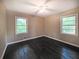 Bedroom features include hardwood floors, a ceiling fan, and natural lighting at 510 Se Boyds Se Dr, Marietta, GA 30067