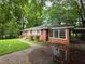 Charming brick home with a well-maintained lawn and mature trees at 510 Se Boyds Se Dr, Marietta, GA 30067
