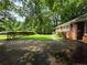 Exterior view shows a well-manicured lawn and brick siding at 510 Se Boyds Se Dr, Marietta, GA 30067