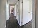 Hallway contains hardwood floors, access to laundry and multiple rooms at 510 Se Boyds Se Dr, Marietta, GA 30067