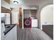 The kitchen is equipped with modern appliances and includes a red front-load washer for added convenience at 510 Se Boyds Se Dr, Marietta, GA 30067