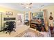 A versatile room with carpet and natural light that could be used for a home office or media room at 5340 Harris Creek Dr, Cumming, GA 30040
