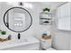 Clean bathroom with a modern mirror, stylish vanity, and updated fixtures, offering a refreshing space at 175 Hunters Gln, Fayetteville, GA 30215