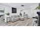 Comfortable living room showcasing a modern design with stylish furniture, decor, and plenty of space for relaxation at 175 Hunters Gln, Fayetteville, GA 30215