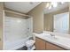 Clean bathroom featuring a shower-tub combo, toilet, and modern vanity sink at 3303 Par Three Way, Lithonia, GA 30038