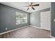 Sun-filled bedroom featuring hard wood floors and an inviting atmosphere at 3303 Par Three Way, Lithonia, GA 30038