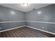 Bedroom with wood floors, neutral paint and ample natural light at 3303 Par Three Way, Lithonia, GA 30038