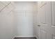 A walk-in closet with hardwood floors and wire shelving at 3303 Par Three Way, Lithonia, GA 30038