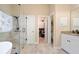 Modern bathroom with a glass-enclosed shower, a separate soaking tub, and a walk-in closet at 3812 Mine Creek Ln, Marietta, GA 30062