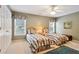 Charming bedroom with two twin beds, floral patterns, and natural light from two windows at 3812 Mine Creek Ln, Marietta, GA 30062