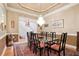 Elegant dining room featuring a chandelier and seating for eight, ideal for entertaining at 3812 Mine Creek Ln, Marietta, GA 30062