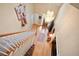 Open two-story foyer with hardwood floors, chandelier, and staircase to the upper level at 3812 Mine Creek Ln, Marietta, GA 30062