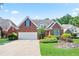 Charming brick home with a manicured lawn and a two-car garage, perfect for suburban living at 3812 Mine Creek Ln, Marietta, GA 30062