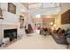 Spacious living room with fireplace, high ceilings, and staircase to the second floor at 3812 Mine Creek Ln, Marietta, GA 30062
