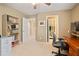 Office area with desk and shelving, showcasing connections to other rooms at 3812 Mine Creek Ln, Marietta, GA 30062