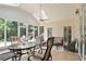 Relaxing screened porch with comfortable seating and an outdoor dining area at 3812 Mine Creek Ln, Marietta, GA 30062