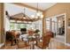 Sunroom with lots of natural light, dining table, and comfortable seating area at 3812 Mine Creek Ln, Marietta, GA 30062