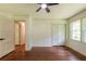 Bedroom with closet, hardwood floors, and natural light at 3219 W Manor Ln, Atlanta, GA 30311
