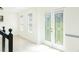 Hallway leading to French doors, offering bright light, and modern look at 3554 Cherry Bloom Way, Decatur, GA 30034