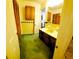 Bathroom featuring vintage yellow and green tile, with ample cabinet space at 3769 Amber Nw Rd, Atlanta, GA 30331