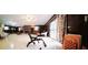 Spacious living area featuring a walk-out to the deck and paneled walls at 3769 Amber Nw Rd, Atlanta, GA 30331